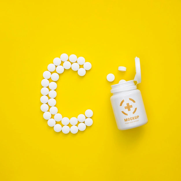 Free Top View Of Bottle With Pills In Shape Of C Psd