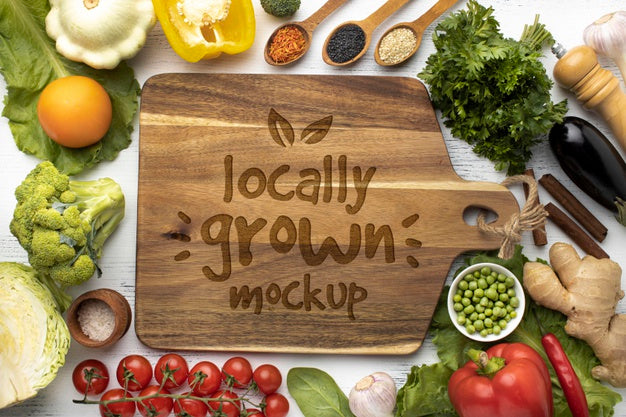 Free Top View Of Chopping Board With Vegetables Psd