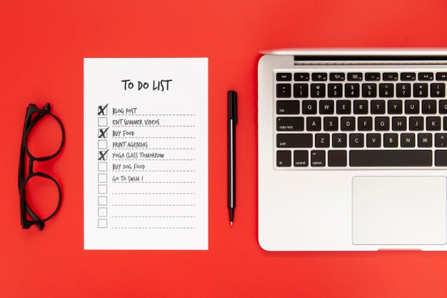 Free Top View Of Desk Surface With Laptop And To Do List Psd