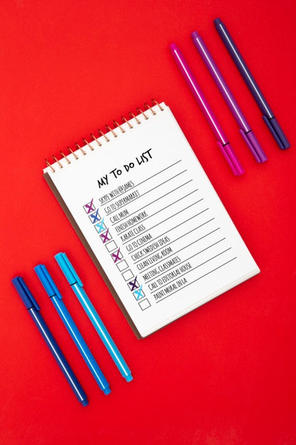 Free Top View Of Desk Surface With To Do List And Pens Psd
