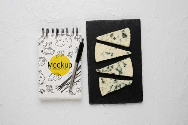 Free Top View Of Notebook And Pen With Moldy Cheese Psd