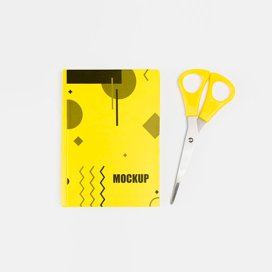 Free Top View Of Notebook With Scissors Mock-Up Psd