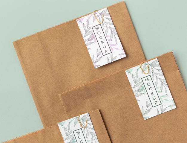 Free Top View Of Paper Shopping Bag Mock-Up With Paper Tag Psd