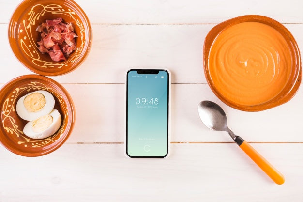 Free Traditional Spanish Food Mockup With Smartphone Psd