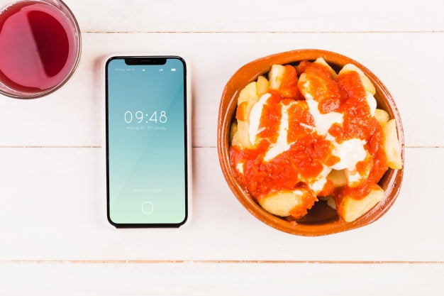 Free Traditional Spanish Food Mockup With Smartphone Psd