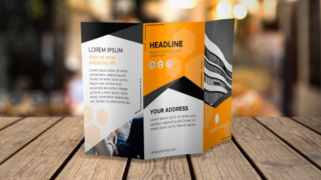 Free Trifold Brochure Mockup On Tabletop Psd