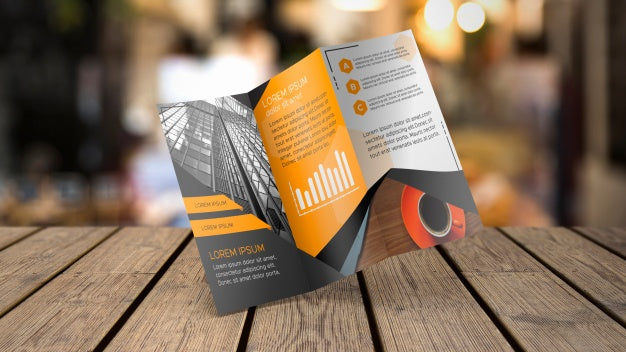 Free Trifold Brochure Mockup On Tabletop Psd