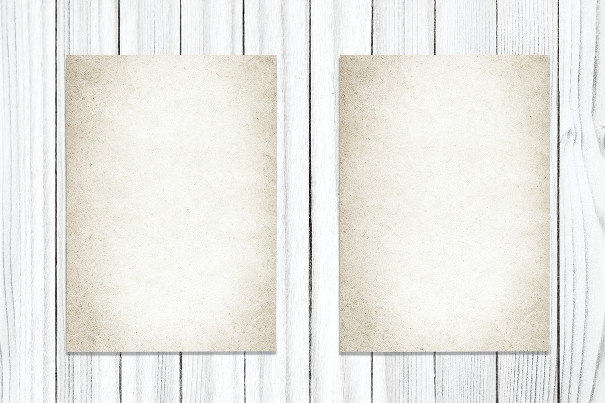 Free Two Vintage Papers On A Wooden Background