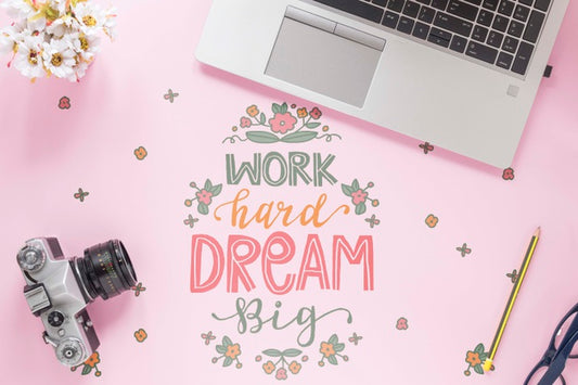 Free Vintage Camera Laptop And Motivational Message On Desk Psd