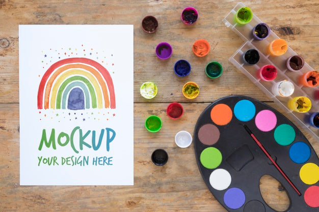 Free Watercolors Set On Desk Psd
