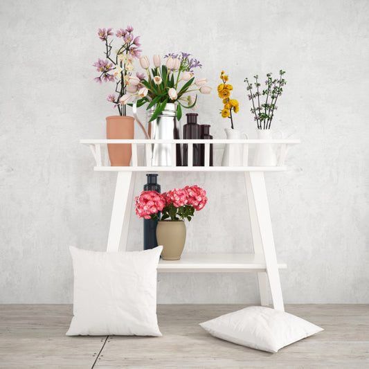 Free White Decorative Furniture With Beautiful Plants And Pillowcases Mockup Psd