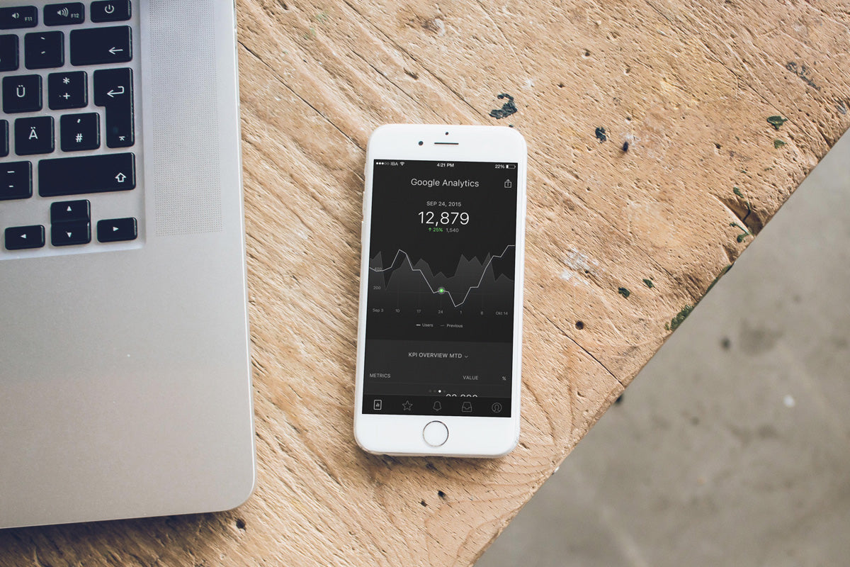 Free White iPhone 8 Mockup on Carpenter Desk