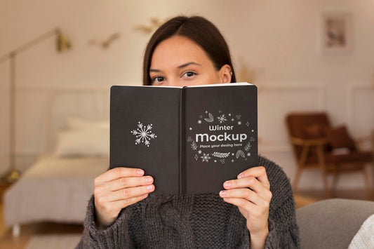 Free Woman Holding A Book Mock-Up Psd