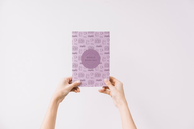 Free Woman Holding Book Cover Mockup Psd