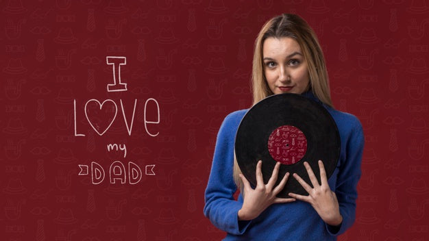 Free Woman Holding Vinyl On Burgundy Background Psd