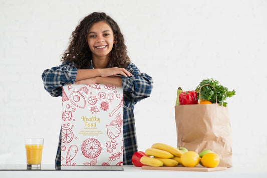 Free Woman In Kitchen With Healthy Vegetables And Fruits Psd