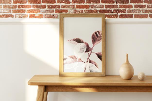 Free Wooden Picture Frame Mockup On A Wooden Sideboard Table Psd