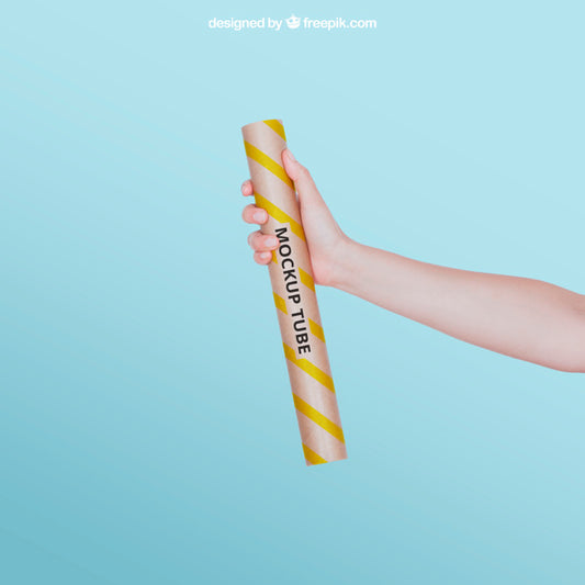 Free Yellow Tube Mockup In Hand Psd