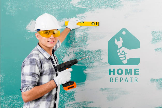 Free Young Handyman Holding A Drill Psd