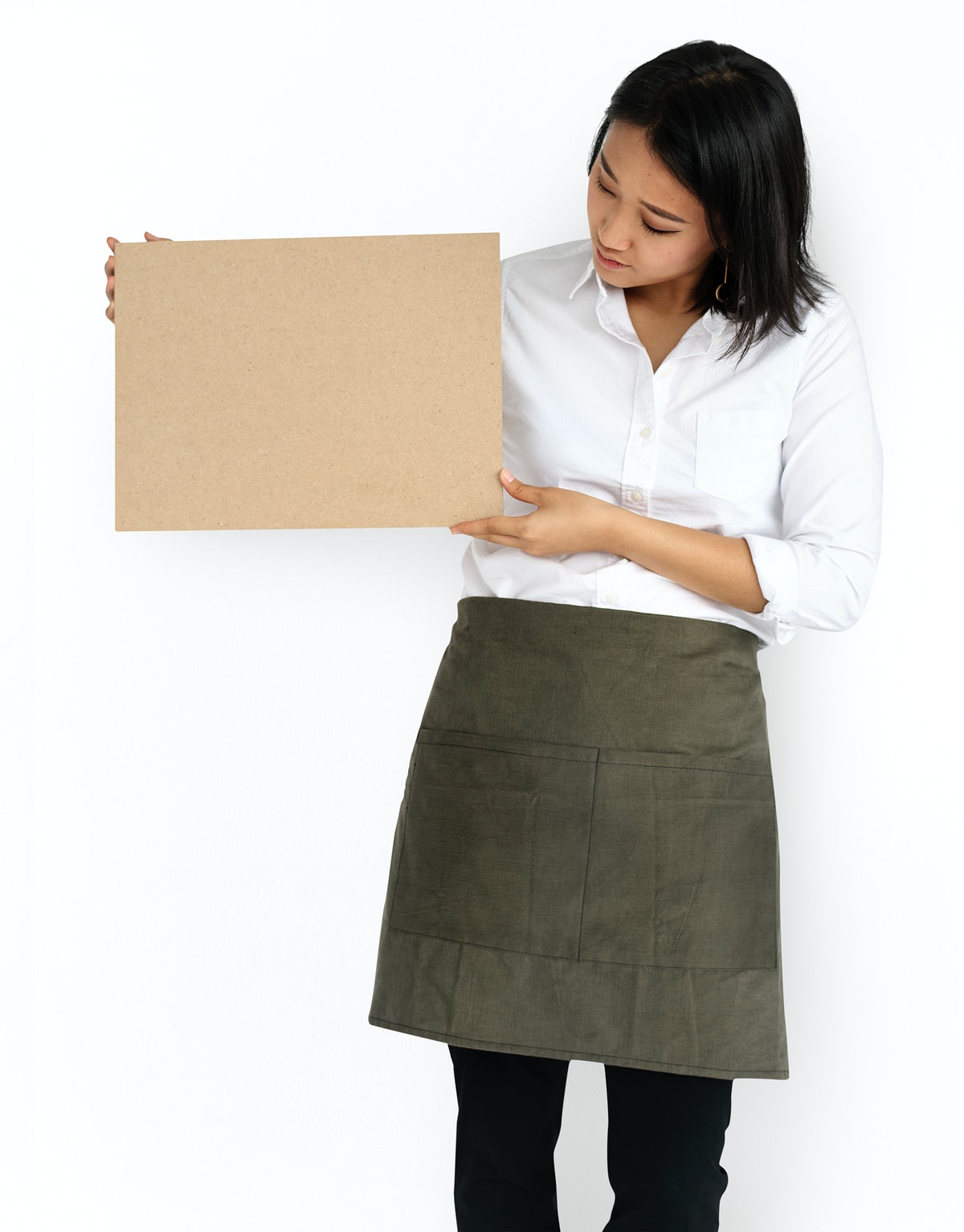 Free Young Woman Holding A Blank Placard